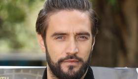 GF Vip, Alex Belli ha lasciato l’Italia: “Game Over”