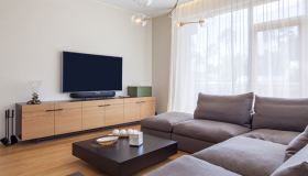 A quale distanza posizionare il divano dal televisore: misure e combinazioni possibili