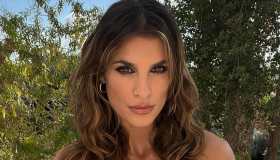 Elisabetta Canalis, lingerie in bella vista con l’abito cut out giallo che però divide i fan