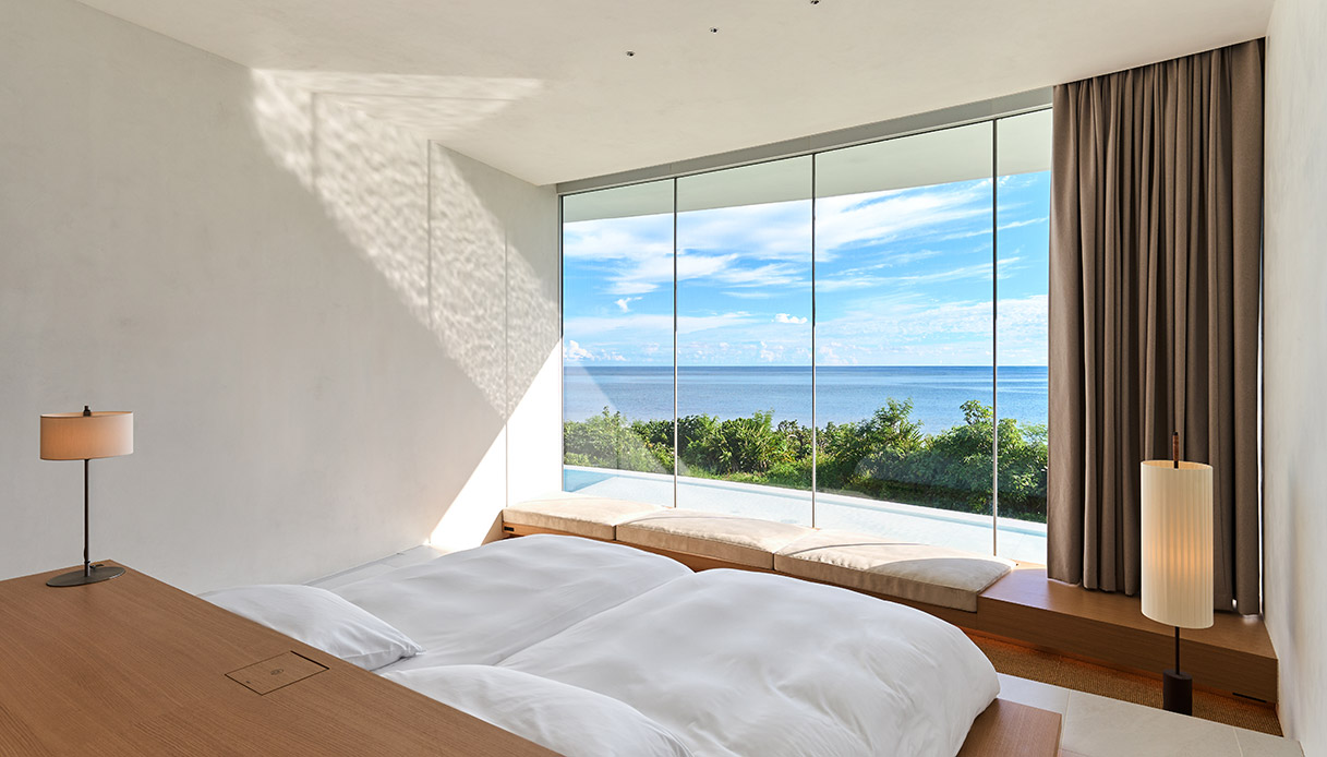 Camera da letto della villa Earth con vista sull’oceano