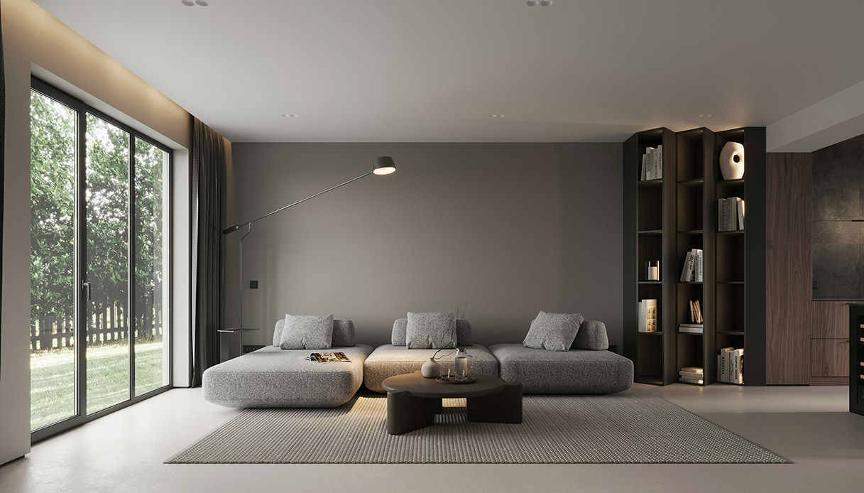 Soggiorno moderno con grandi finestre, divano e arredi minimal