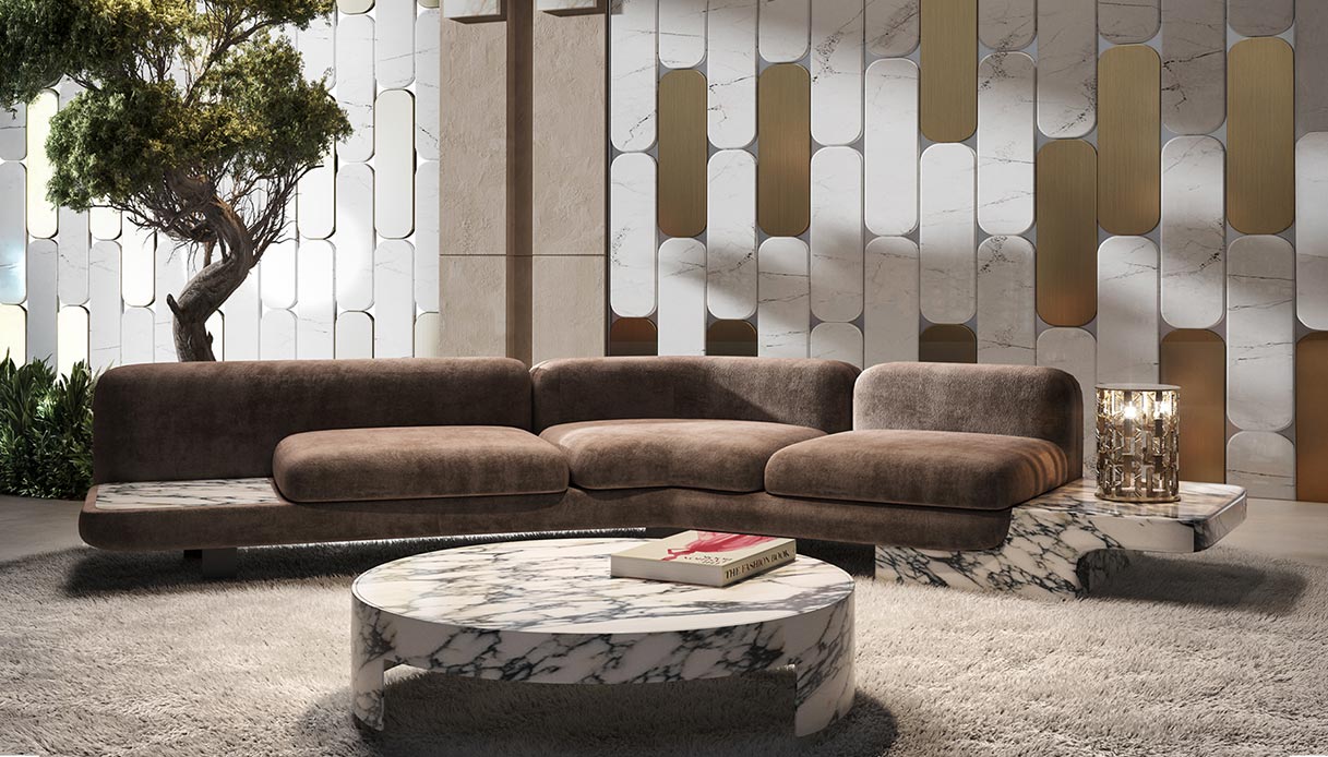 Divano Sebastien di Diviana con base in marmo e rivestimento morbido in living contemporaneo