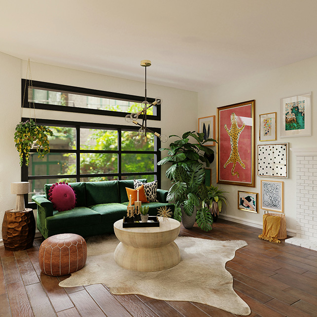 Soggiorno con divano verde velluto, piante tropicali, tappeto in pelle e gallery wall con stampa di leopardo su sfondo rosa