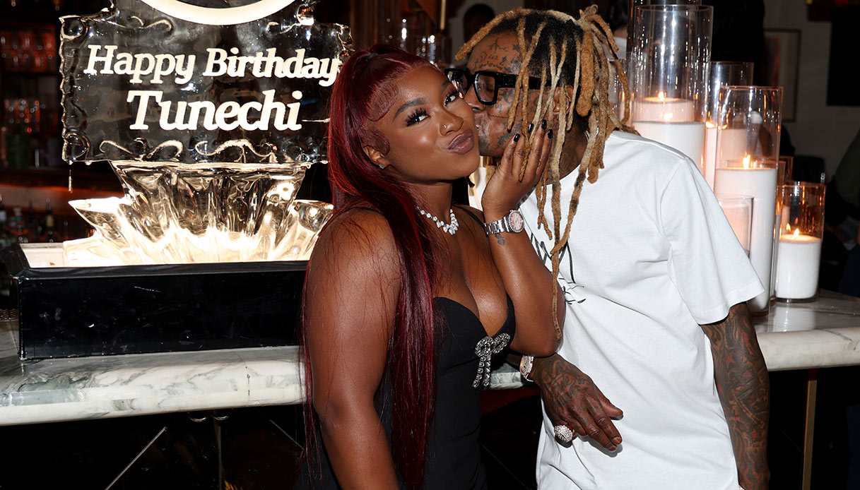 Reginae Carter e suo padre Lil Wayne nel 2022